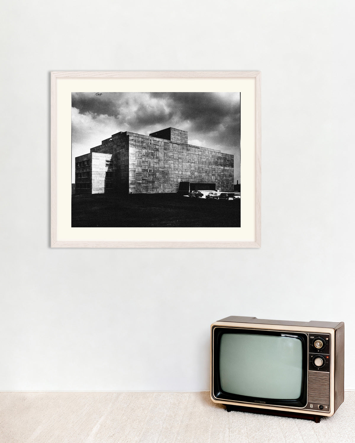 Poster of Concrete Building Under a Storm, with white wooden frame