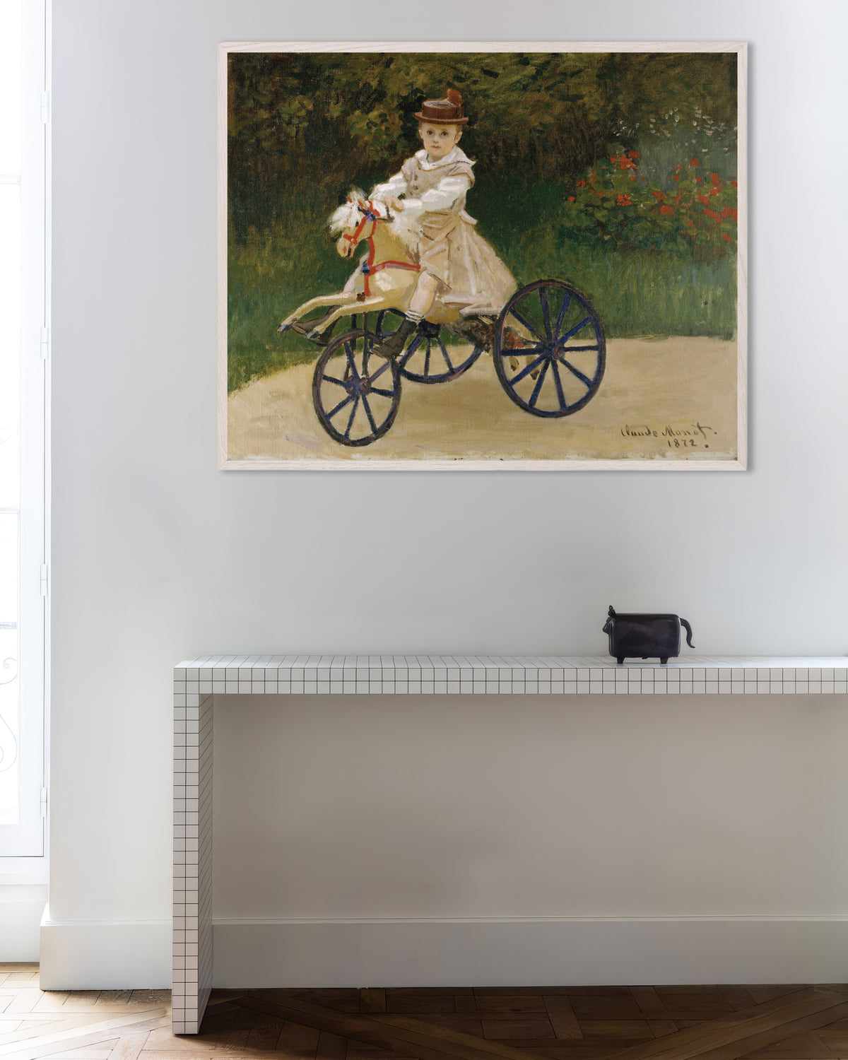 Poster of Jean Monet on His Hobby Horse (1872) by Claude Monet, with white wooden frame