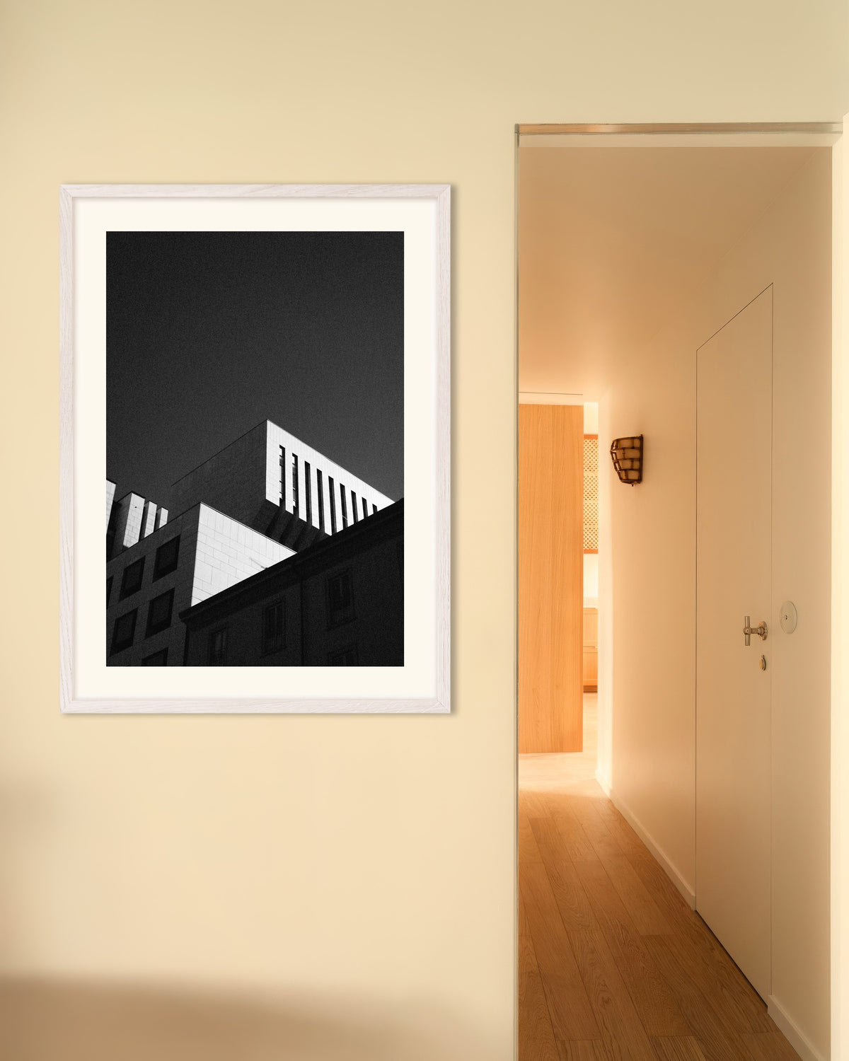 Poster of Rooftops Against a Dark Sky, with white wooden frame