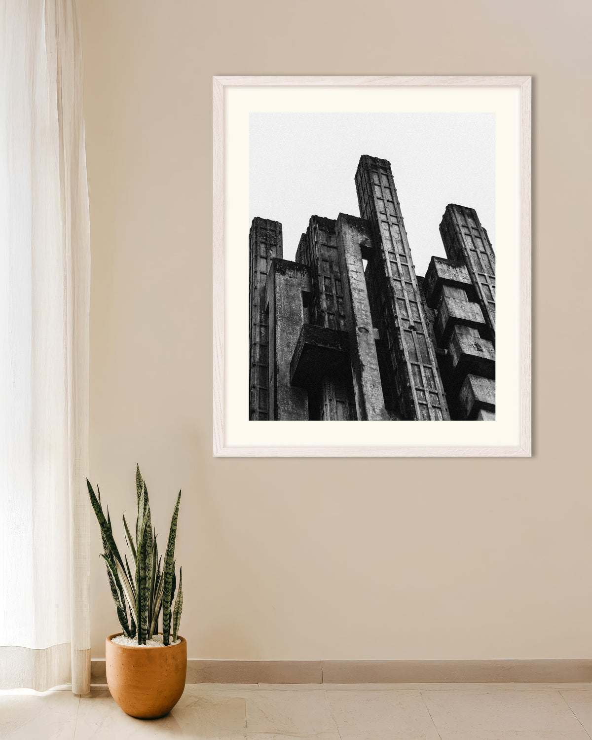 Poster of Jagged Concrete Towers, with white wooden frame