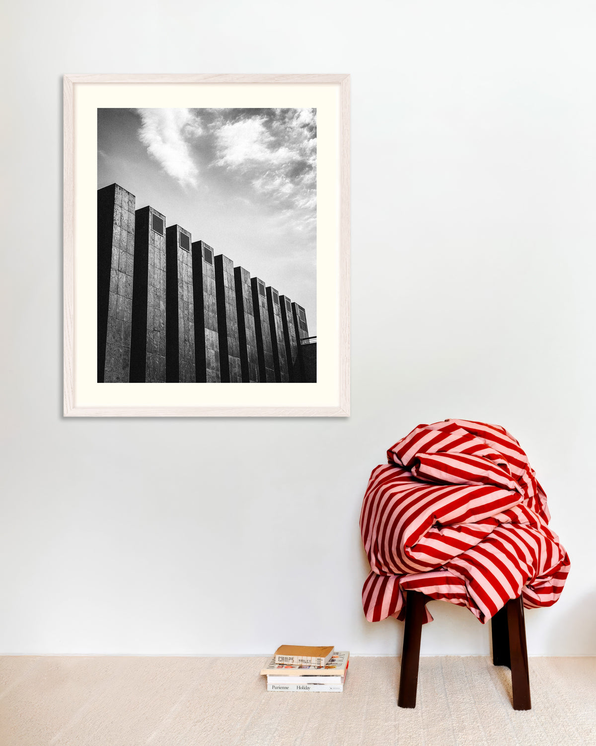 Poster of Row of Dark Fins and Clouds, with white wooden frame