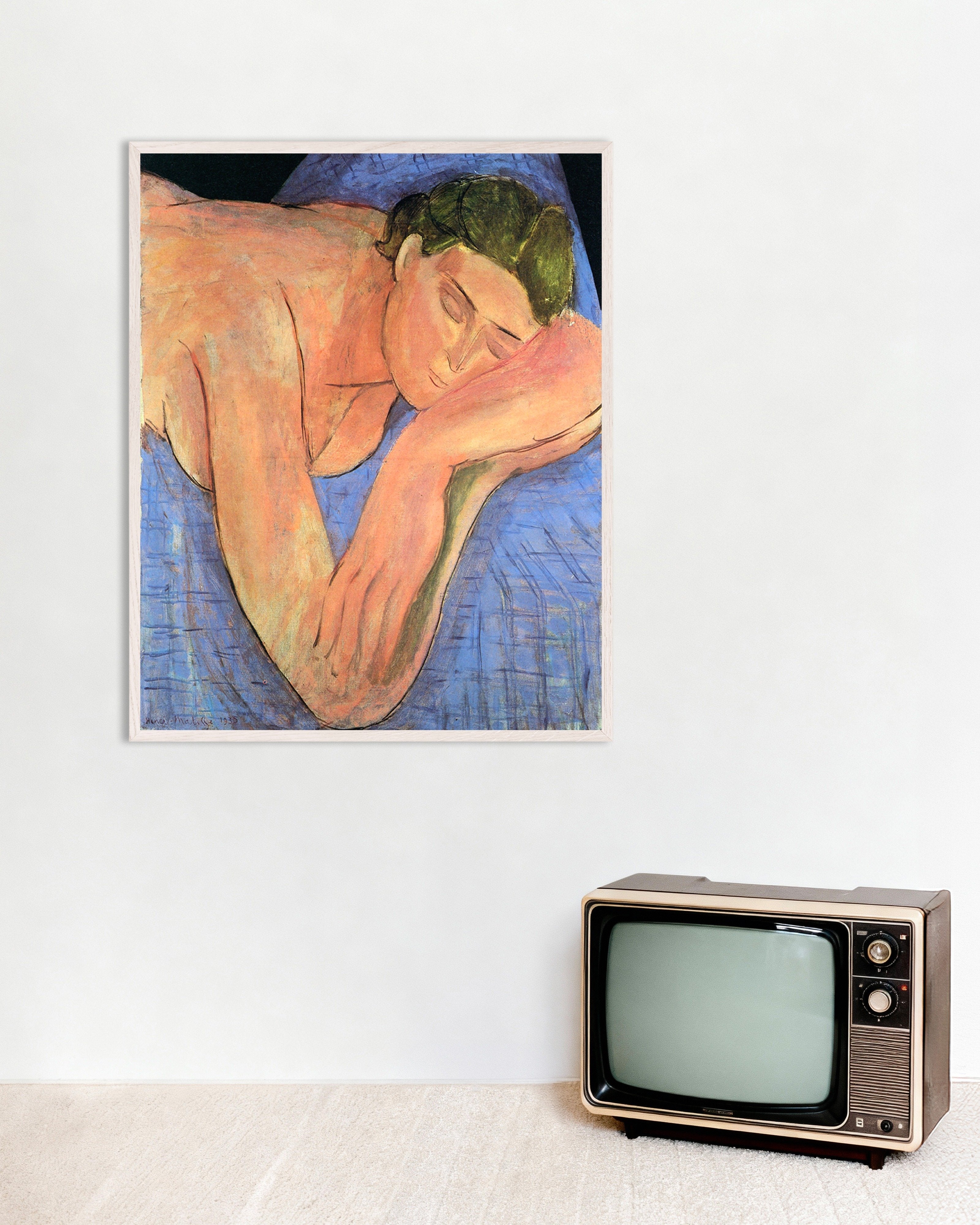 Poster of The dream (1935) by Henri Matisse, with white wooden frame